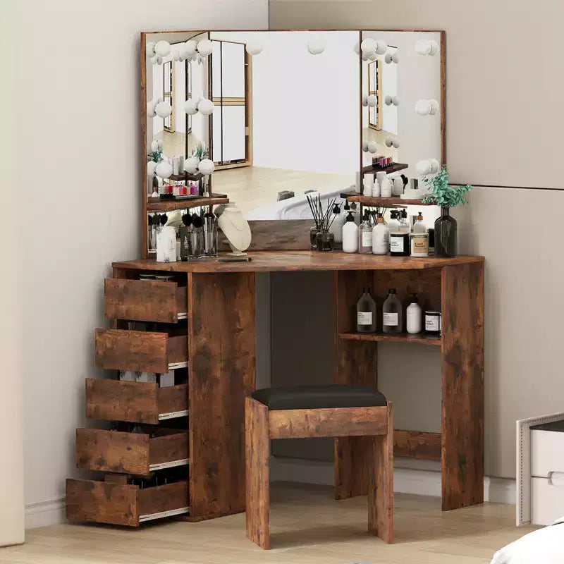 Coiffeuse d'angle avec miroir et éclairage offrant 3 couleurs de lumière réglables, 5 tiroirs et des étagères de rangement, complétée par une table de maquillage éclairée par LED.